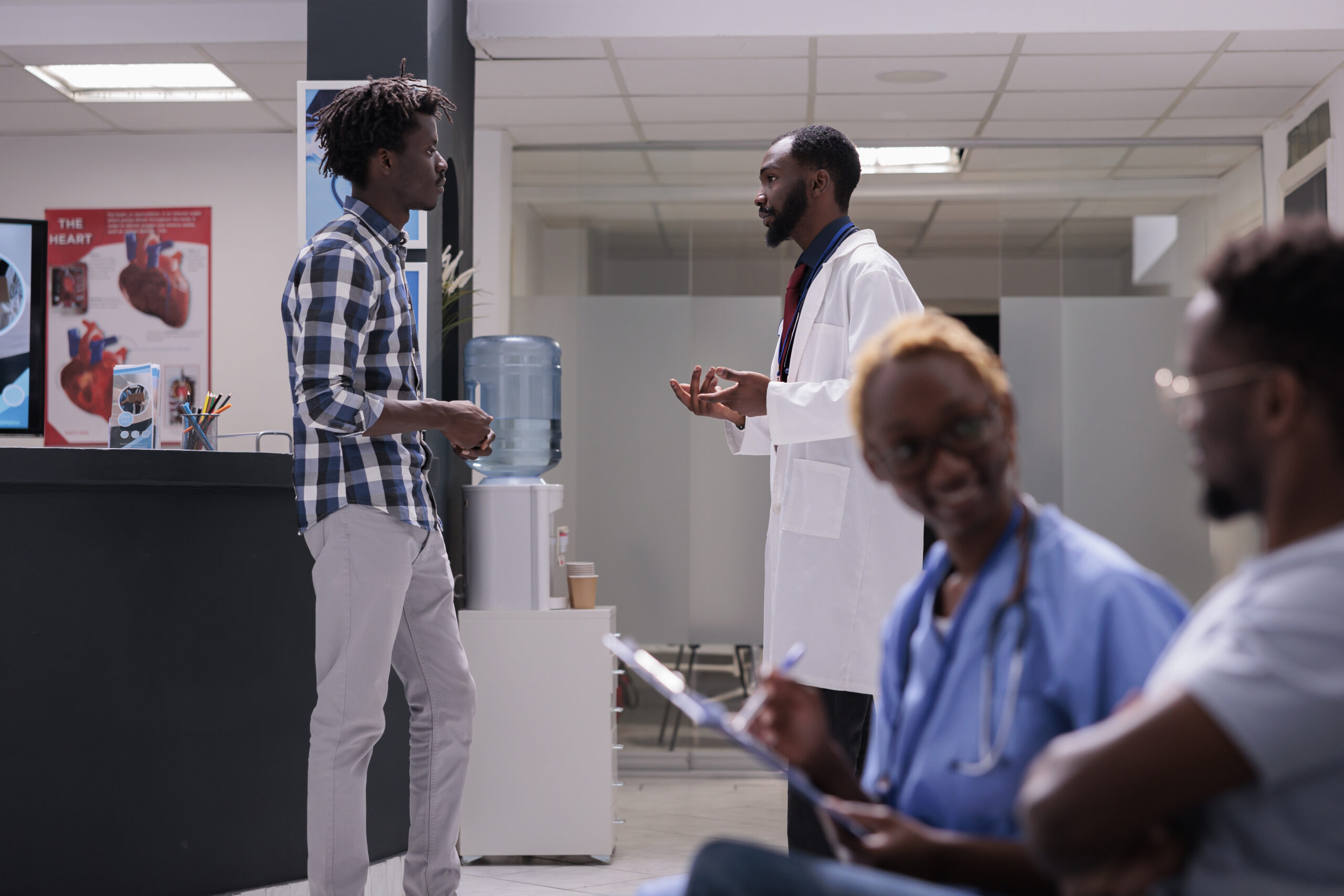 A practicum student and a medic talking
